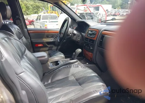 1999 Jeep Grand Cherokee Limited from USA, damaged, VIN 1J4GW68N9XC808639